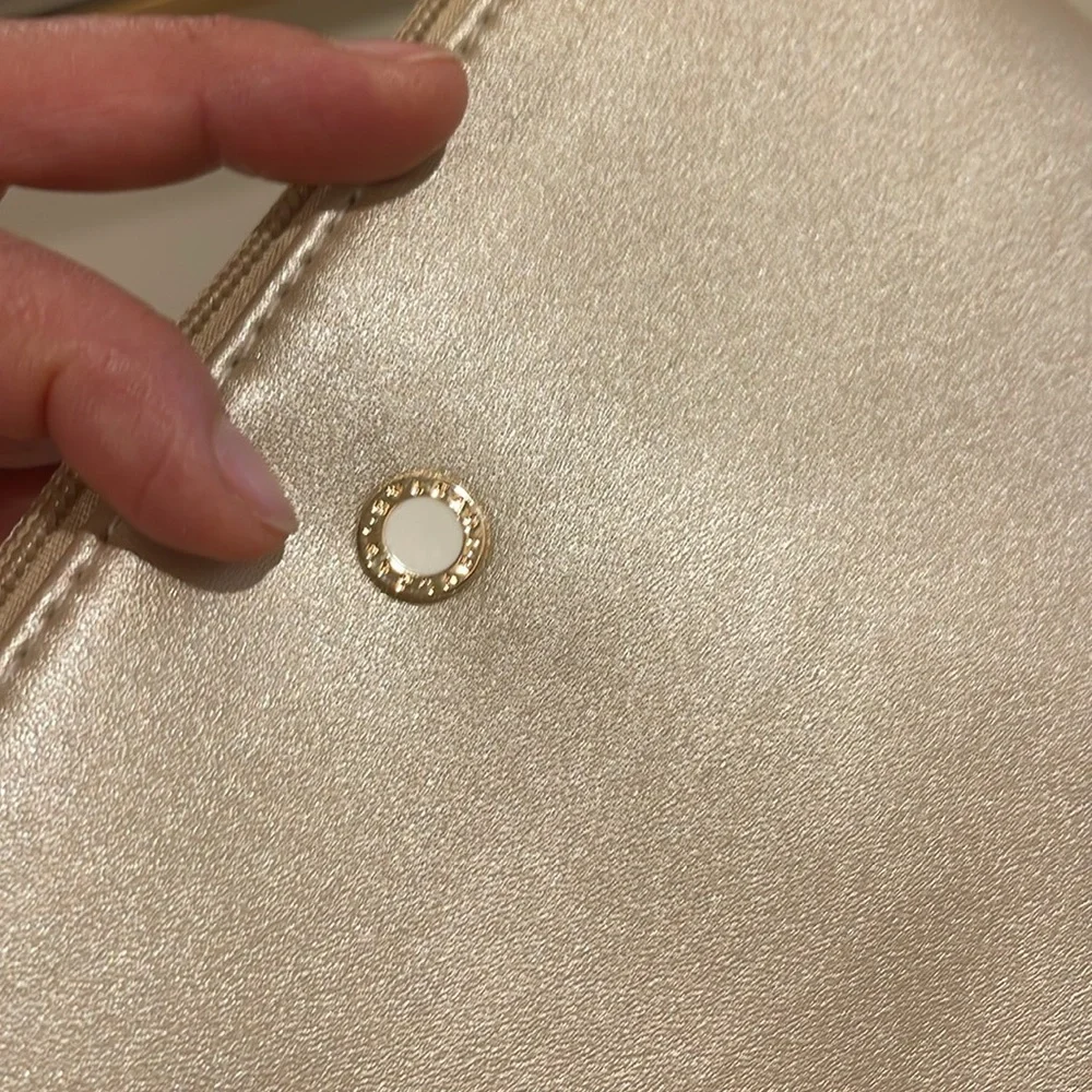 Bvlgari metallic gold faux leather cosmetics bag